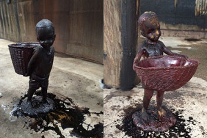 The blackamoor-like figures standing in a puddle of molasses.