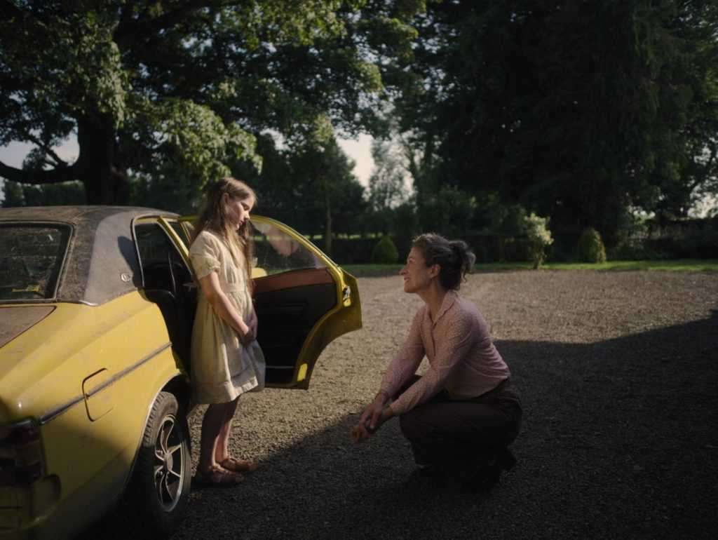 The Quiet Girl Cait Catherine Clinch is greeted by the woman of the house Eibhlin Carrie Crowley after a long journey