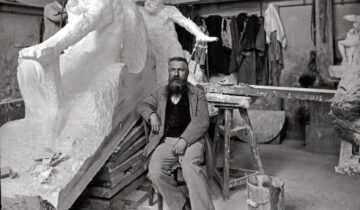 Paul Marsan Dornac, Rodin seated in his studio in front of the Monument to Victor Hugo, 1898. Bridgeman Images