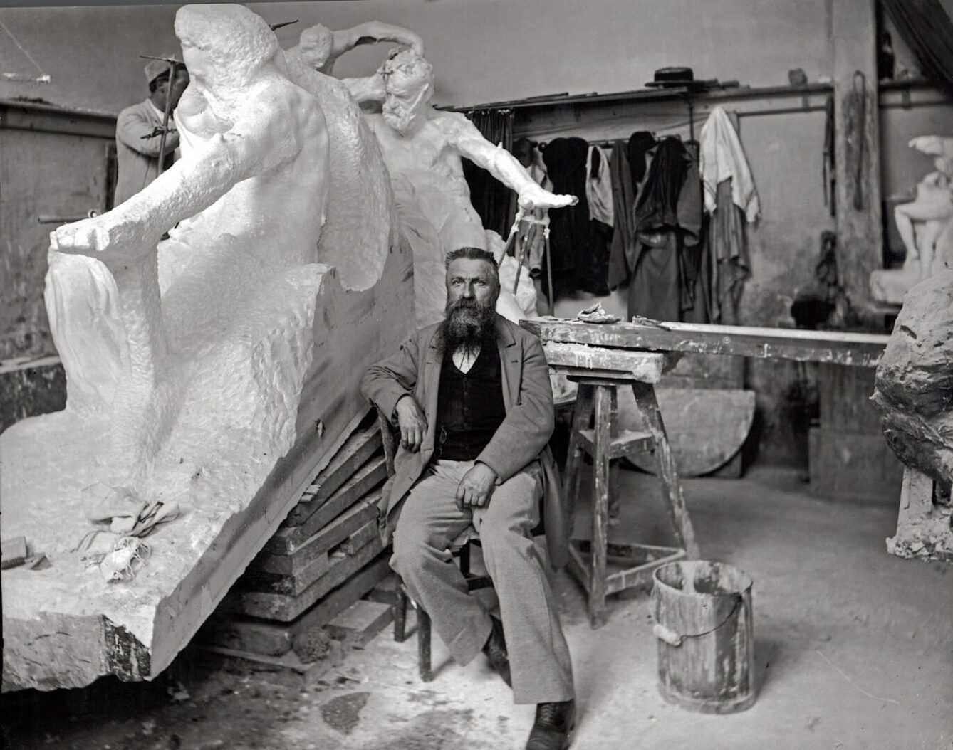 Paul Marsan Dornac, Rodin seated in his studio in front of the Monument to Victor Hugo, 1898. Bridgeman Images