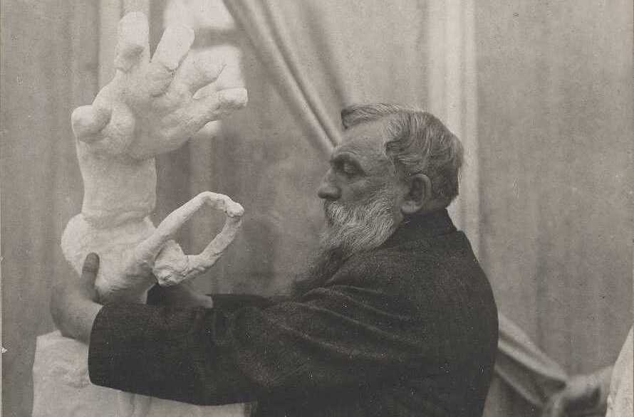 Unknown photographer, Rodin placing the plaster 'Clenched Hand with Imploring Figure' on a pedestal, in the Pavillon de l'Alma, Meudon, 1906. Musée Rodin