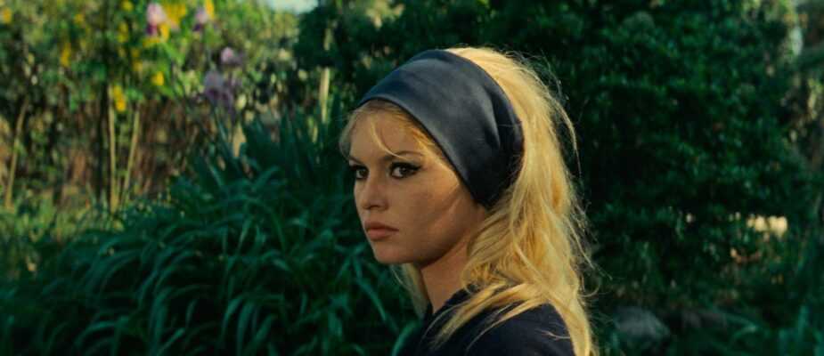 A film still from Godard's Contempt with Brigitte Bardot in profile wearing a black headband.