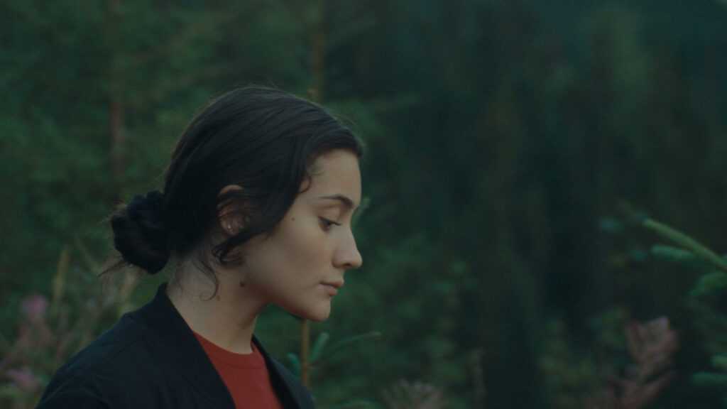 A film still from Who By Fire.