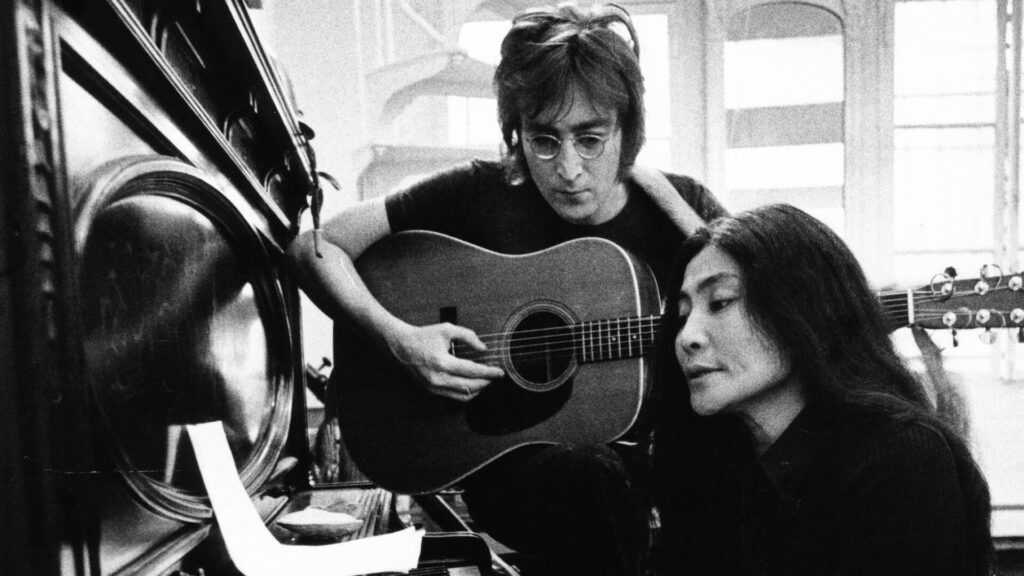John Lennon & Yoko Ono in a film still from One to One: John and Yoko