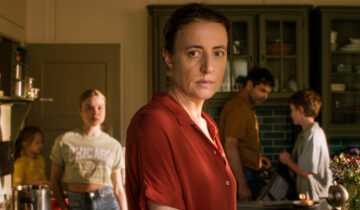 A film still from The Sparrow and the Chimney featuring Karen and family in kitchen