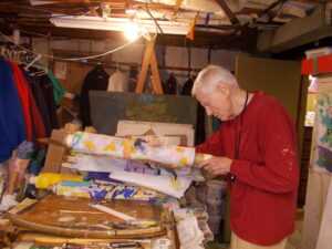 Paul Reed working in his basement by Mokha Laget 2013